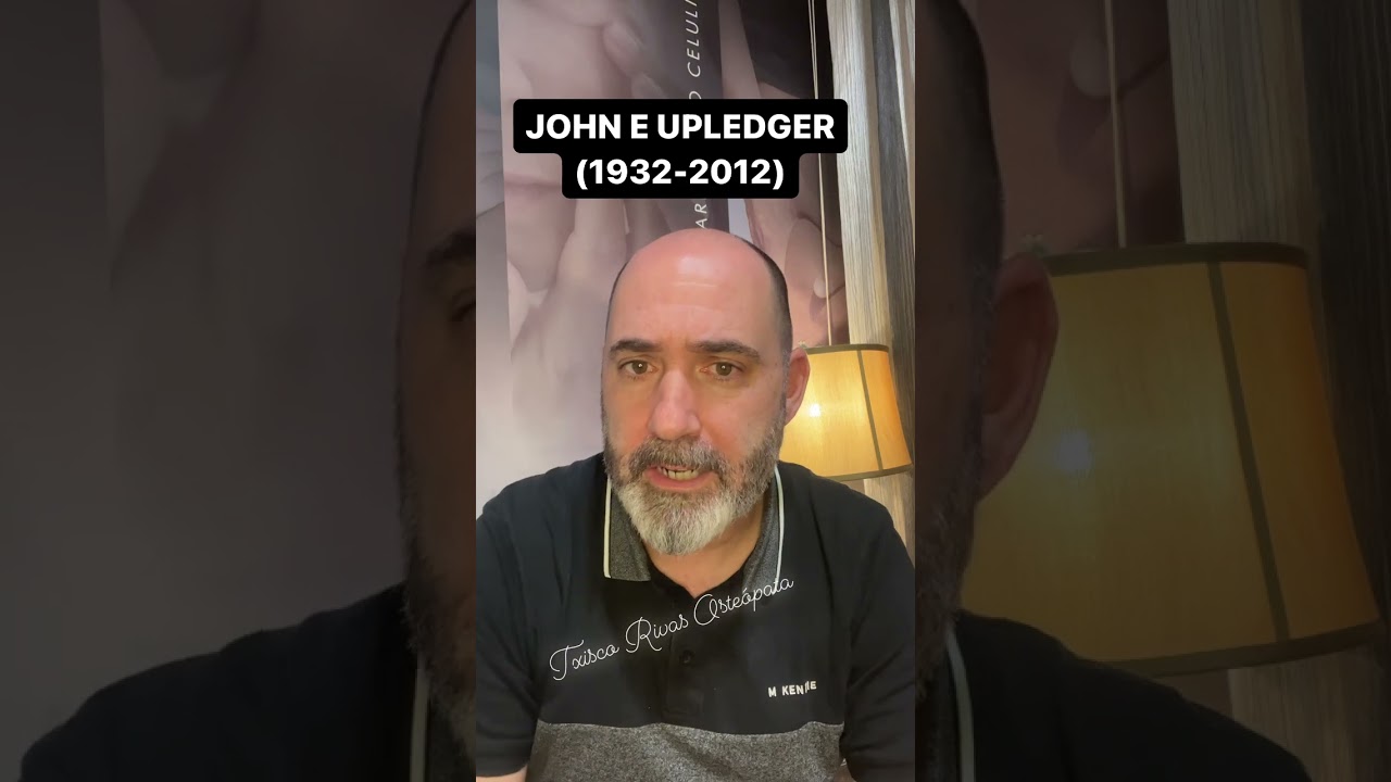 Dr JOHN UPLEDGER