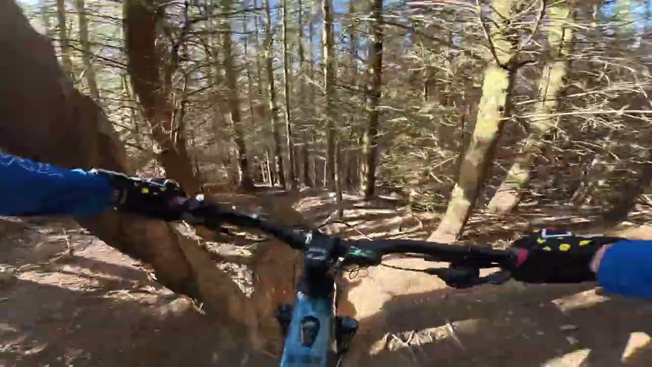 Golfie mountainbike trails - Dropping into community service.