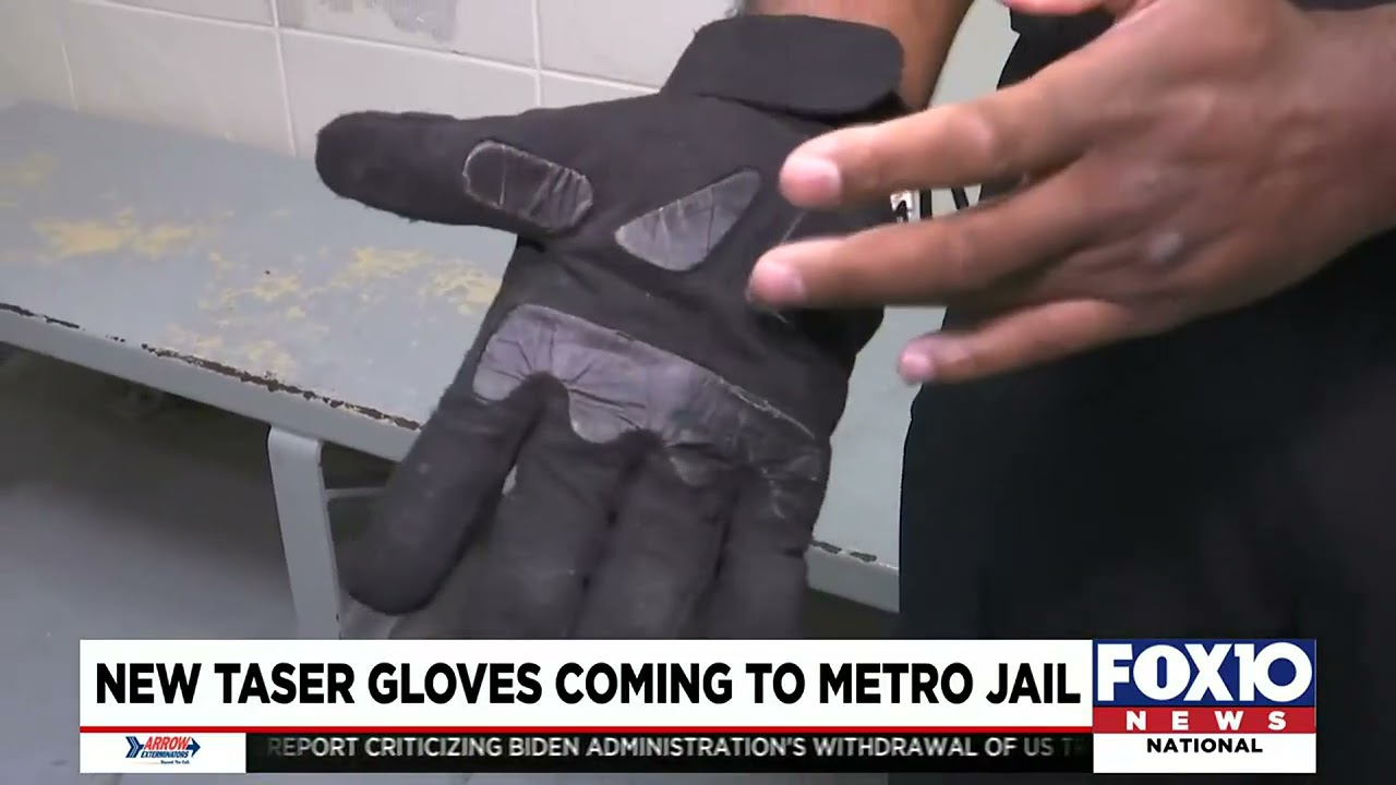 Corrections officers at Metro Jail use wearable shock gloves to help with inmate compliance