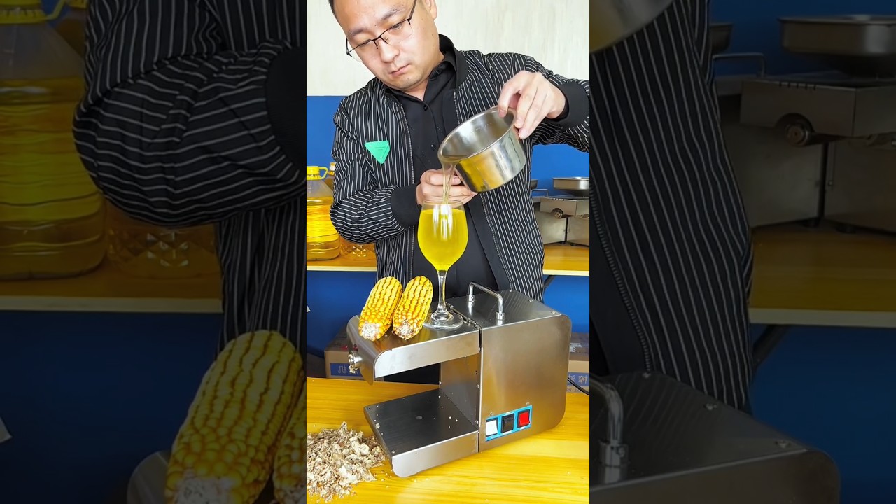 Oil production process from corn and groundnut