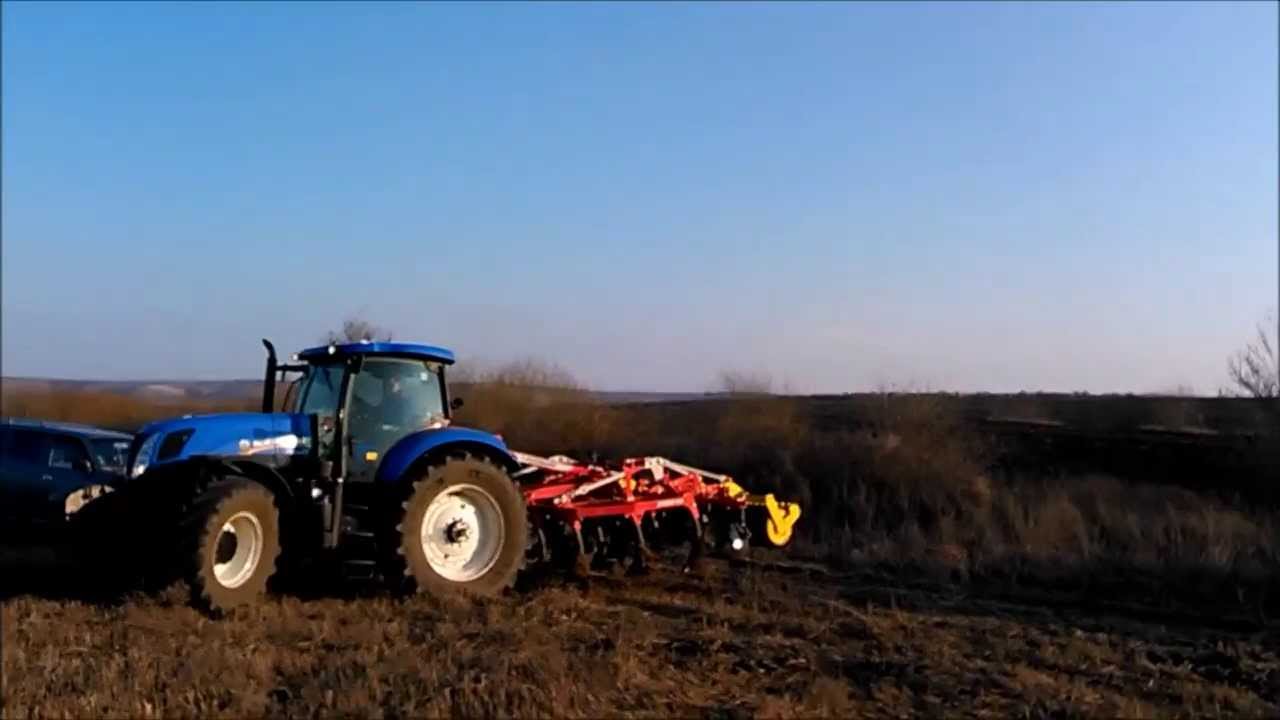 New Holland T7.260 with Pottinger Synkro 4030 K.