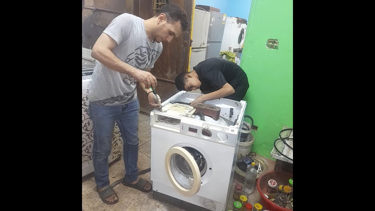 تجميع غساله ايديال زانوسي 18 برنامج الموديل القديم بعد الصيانه الجزء الثاني 01118044142