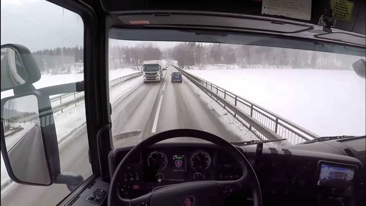 Winter/snowy Scania g450 2015, truck + dolly trailer driving (POV). Stockholm, Sweden.