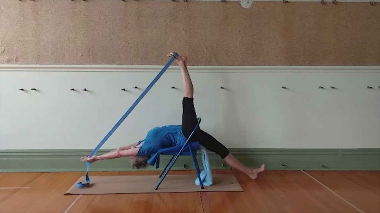 Iyengar Yoga teachers using a chair