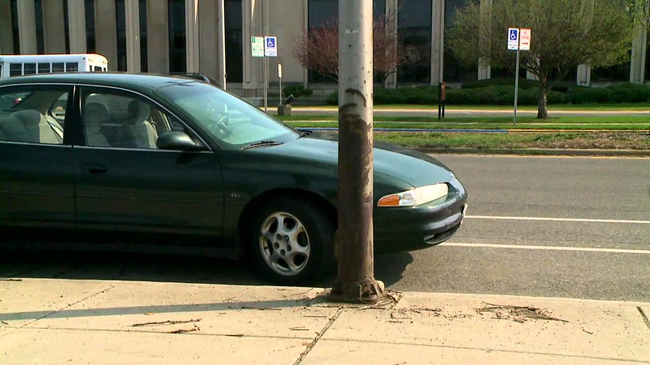 Light pole falls in busy traffic
