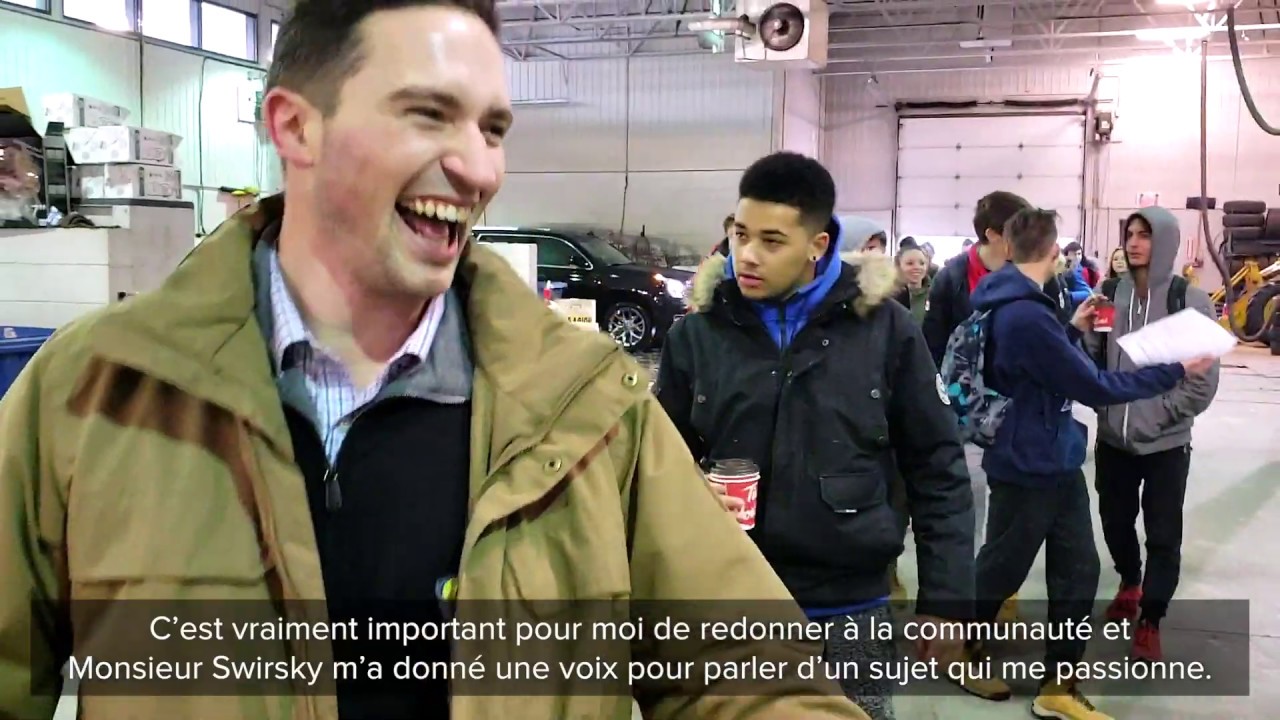 John Rennie High School students learn about buying a used car