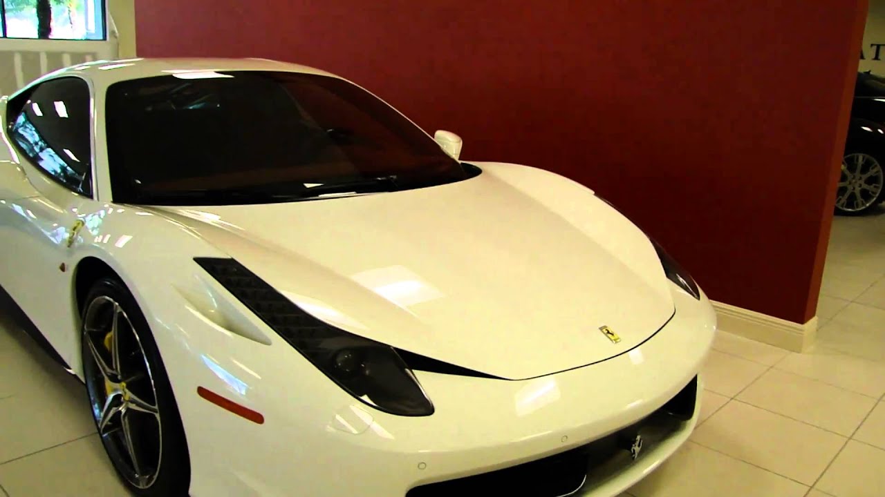 White Ferrari 458 Italia with red interior