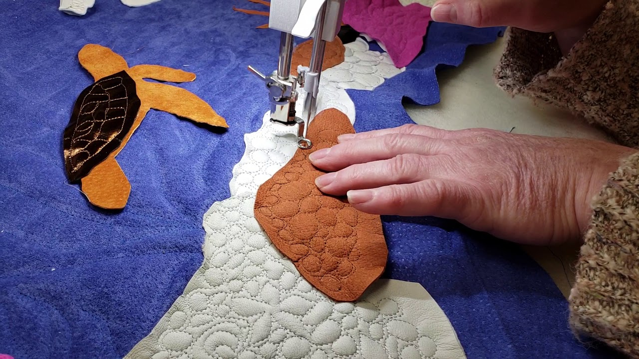 Raw edge leather applique