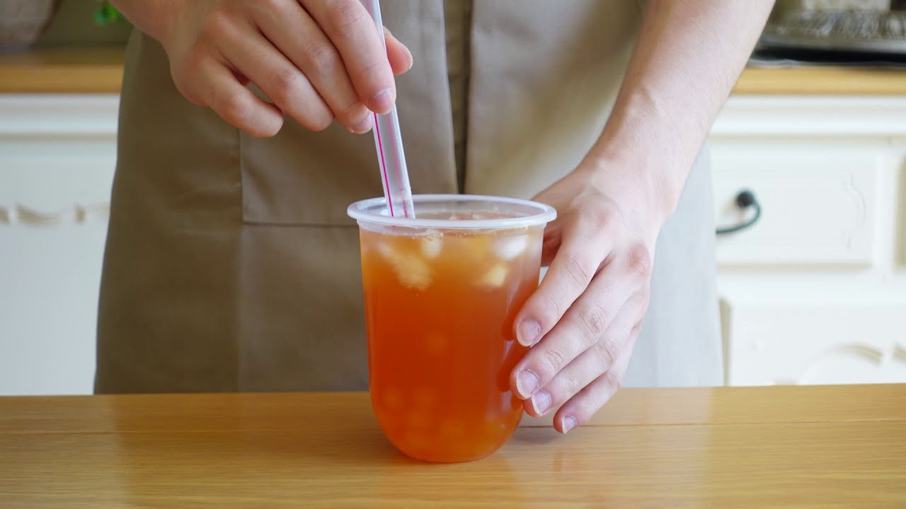 Peach Bubble Tea (Boba) with Passionfruit Popping Pearls