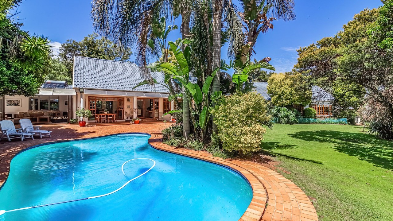 LIVE LARGE, ENTERTAIN IN STYLE, AND ENJOY ULTIMATE VERSATILITY IN ONE EXCEPTIONAL HOME