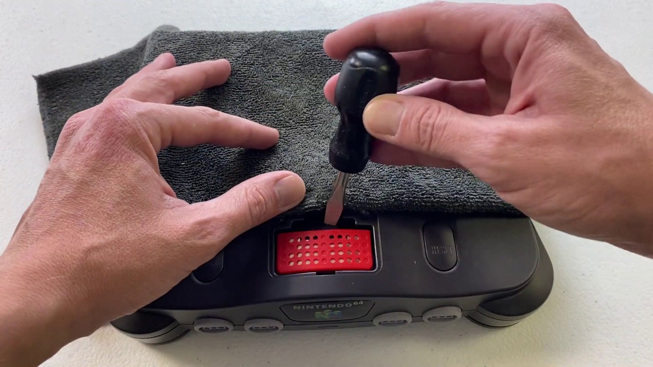How to remove a jumper/expansion pak from an N64