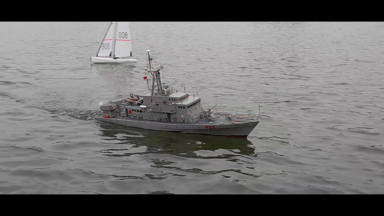 2 Electric powered Rc warships & few rc sailboats on the lake.