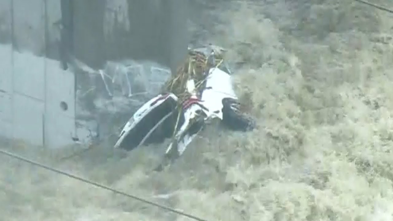 Car Swept Away in LA River During Epic Flooding