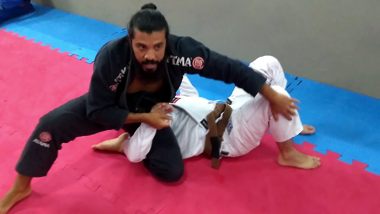 Programa 02 - Raspagem de Guarda Laçada com Variações - André Machado BJJ