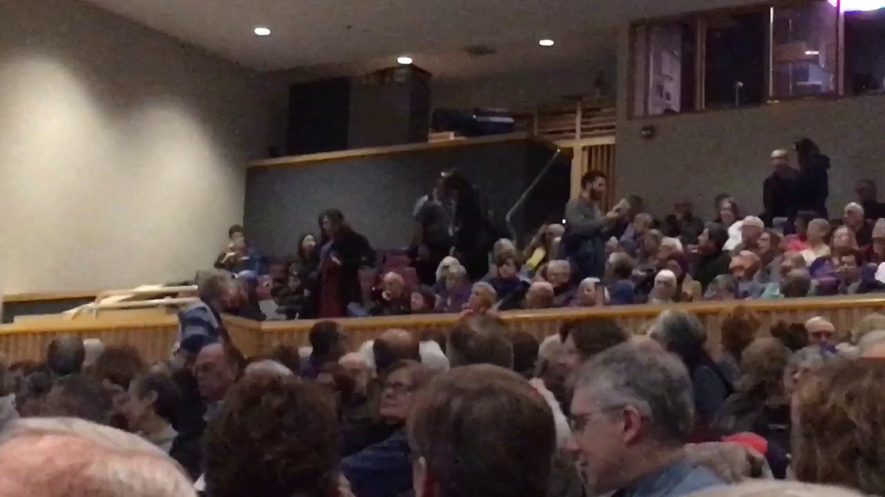 Protesters disrupt immigration speaker Mark Krikorian