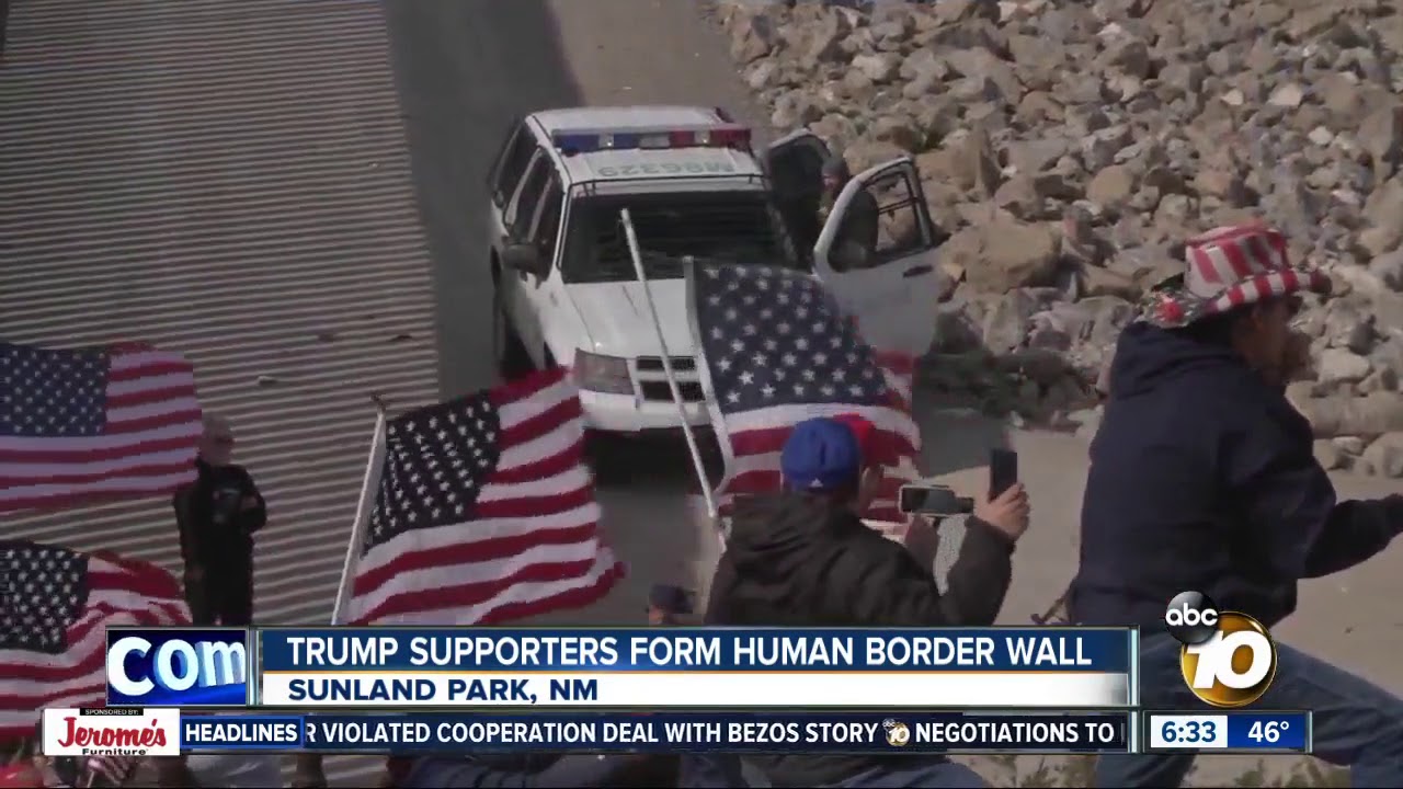 Trump supporters form human wall