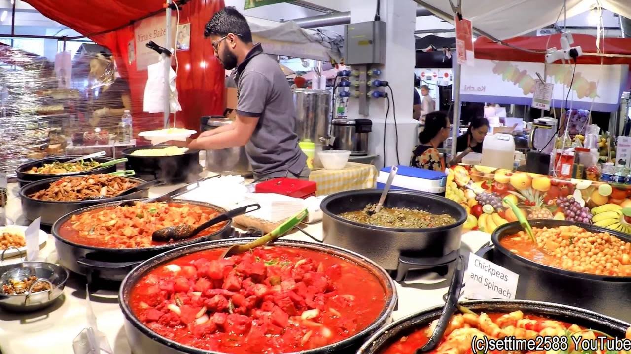 London. A Walk Trough The Street Food Stalls and the Vintage Shops of Brick Lane