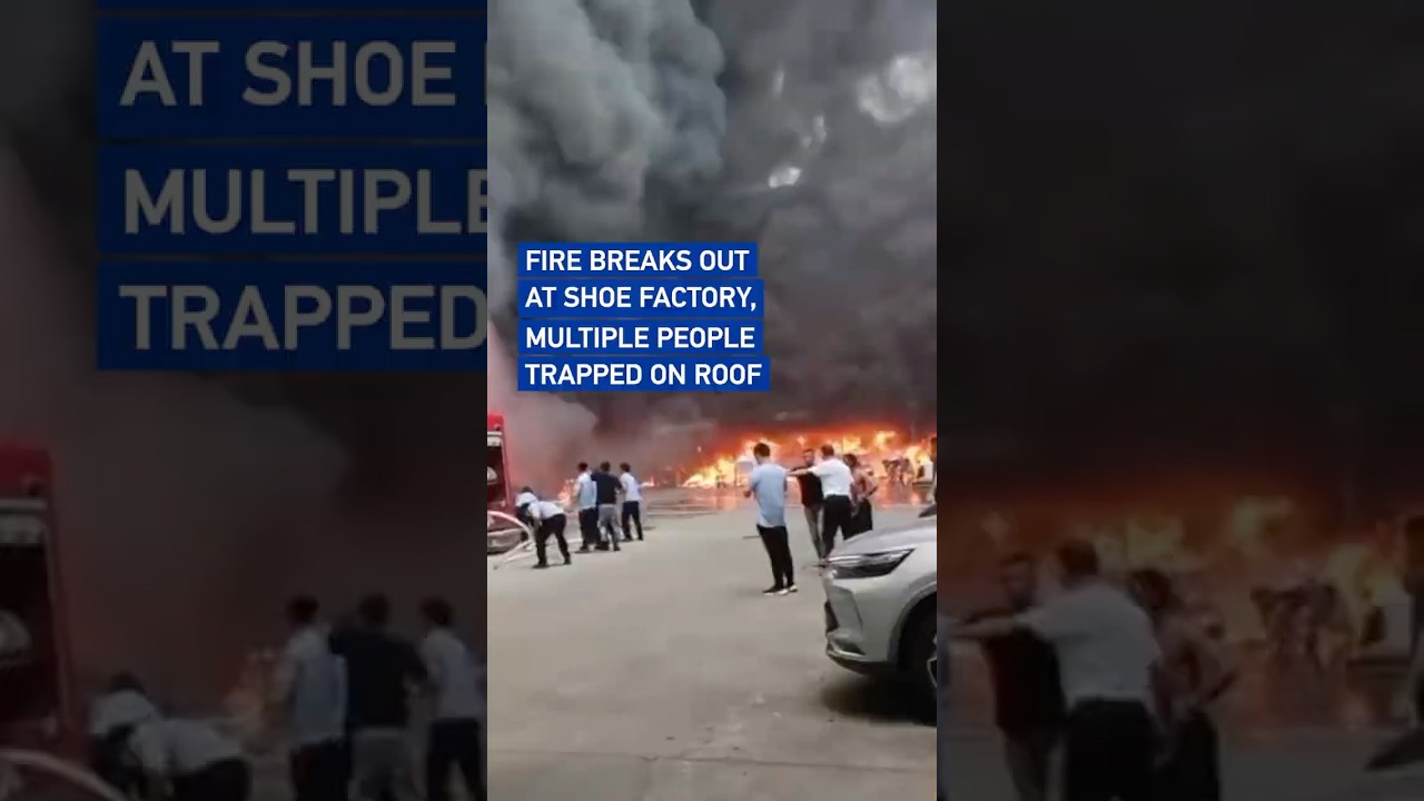 Fire breaks out at shoe factory, multiple people trapped on roof