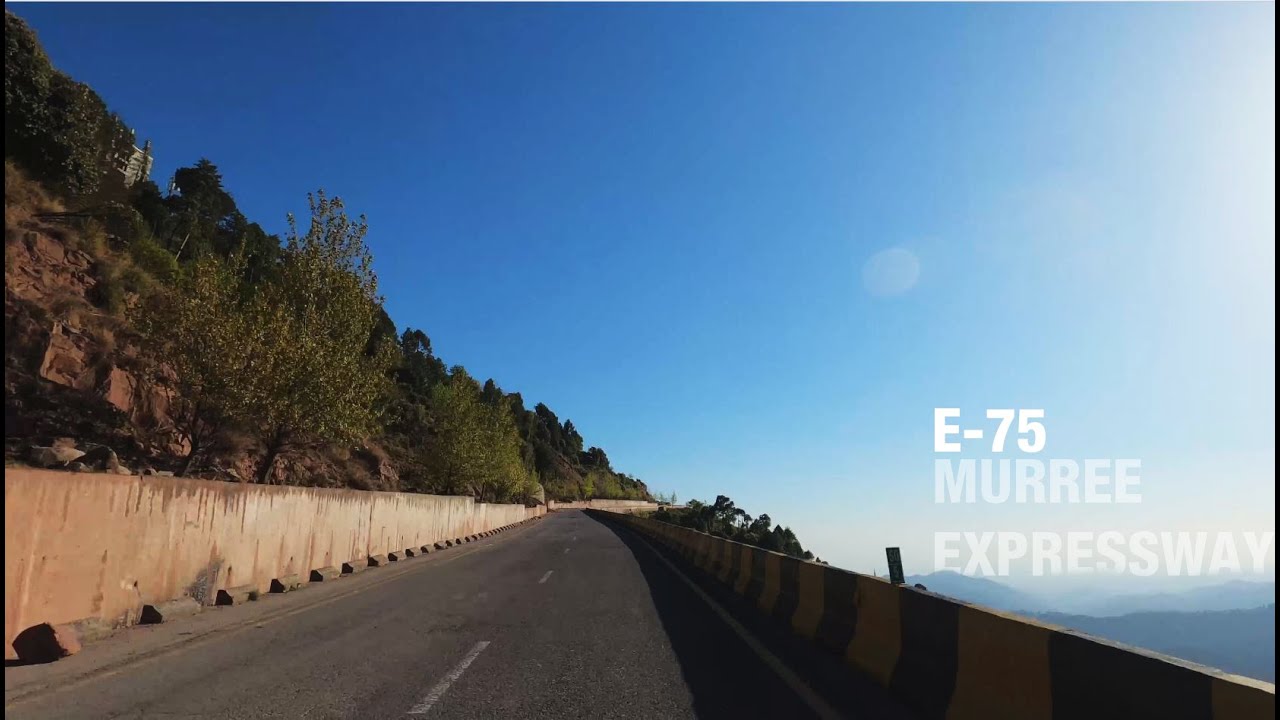 Exploring Pakistan's Majestic Mountains on a Scenic Highway Drive. Murree Expressway.