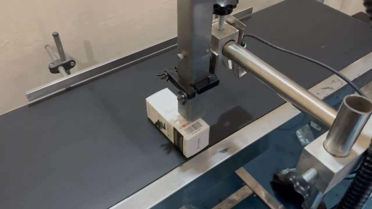 Fill box mono carton printing on conveyer vedeo 