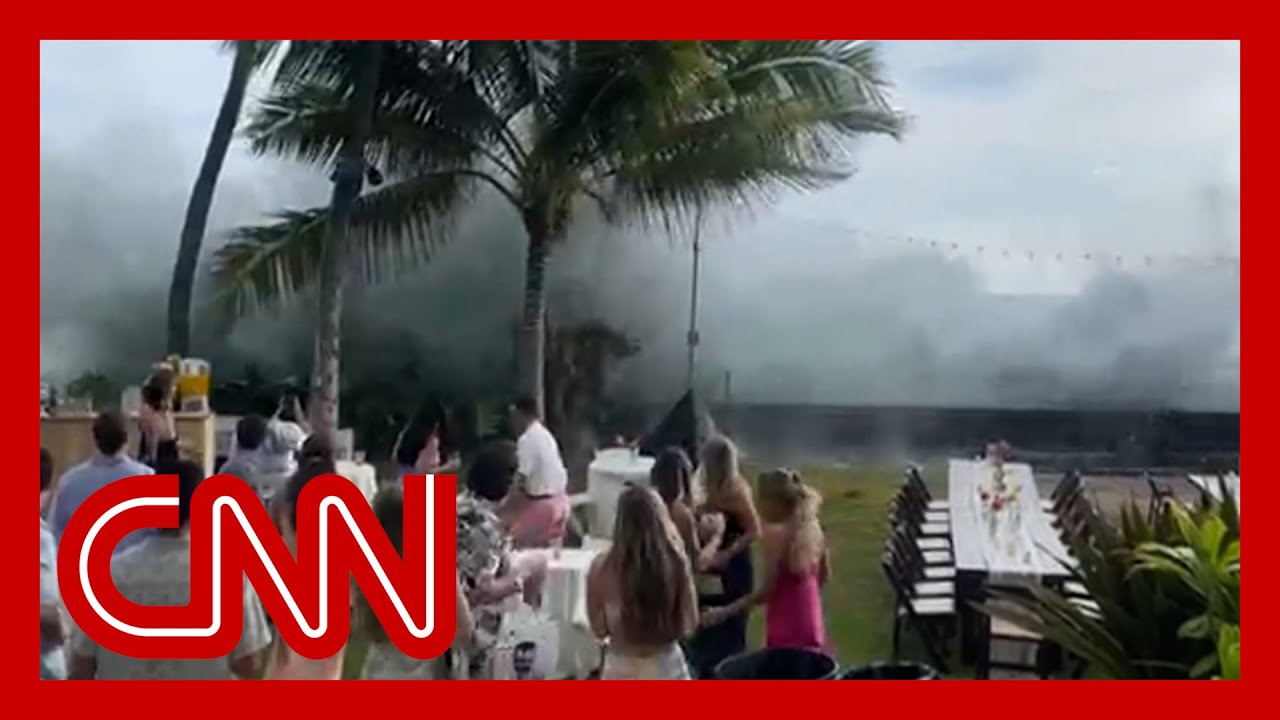 Watch massive waves wipe out wedding in Hawaii