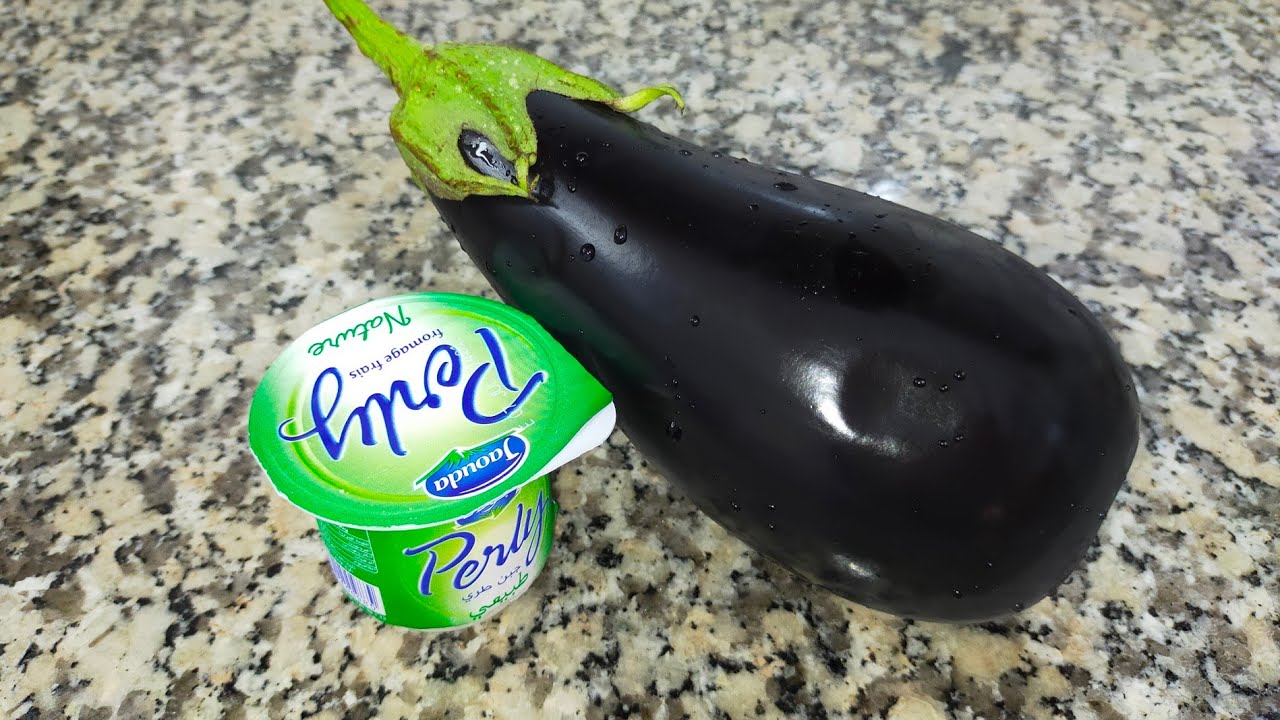 عندك حبة دنجال 🍆 و جبن طري أجي نحضرو ألذ أكلة صيفية متشبعوش منها 😋