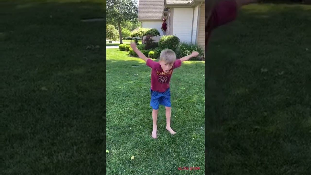 Little kid does a crazy backflip!