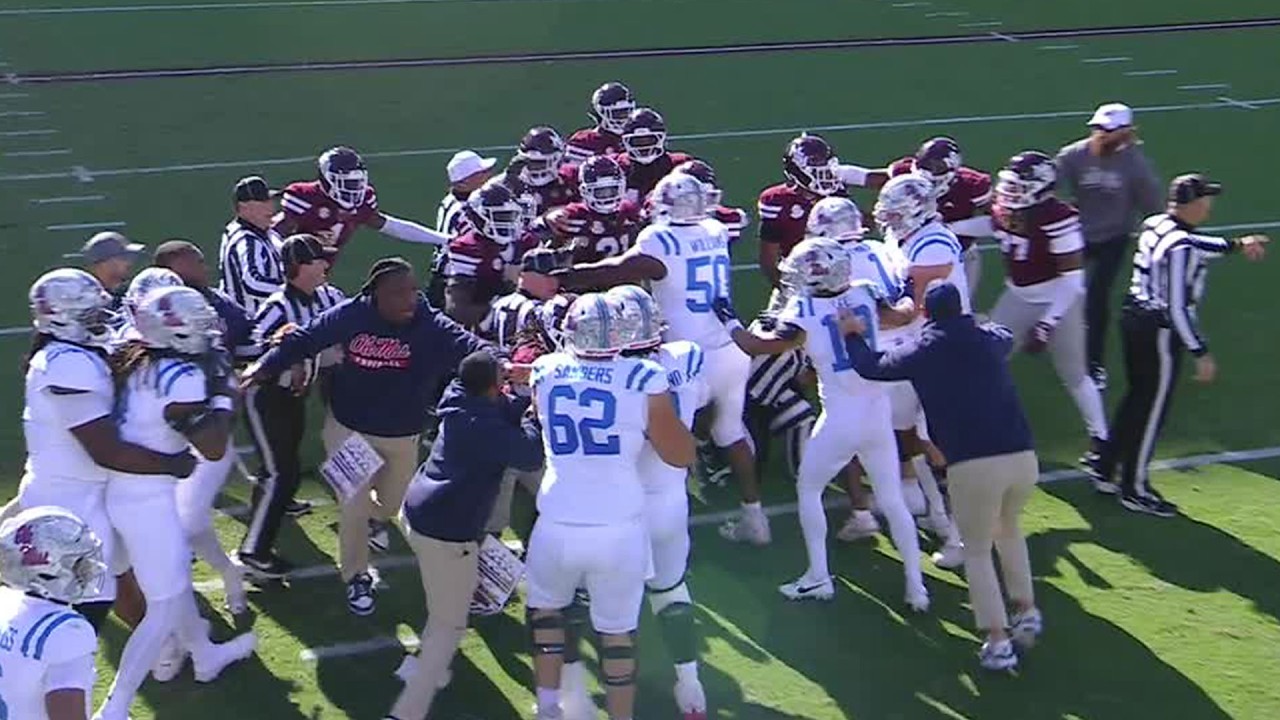 EGG BOWL SCUFFLE 🍿 Ole Miss fumble turns into an ALL-OUT BRAWL vs. Mississippi State 😳 | ESPN CFB
