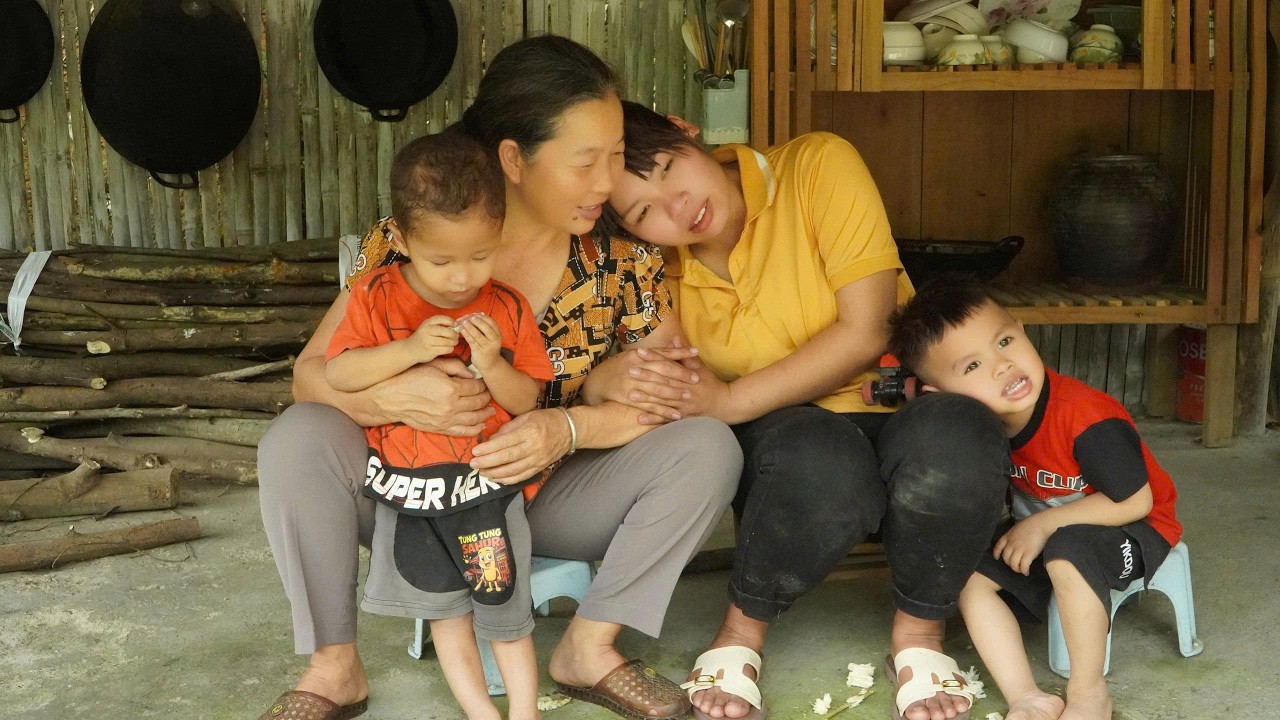 Ngoan told her foster mother about Tu. The new chicken coop is being completed.