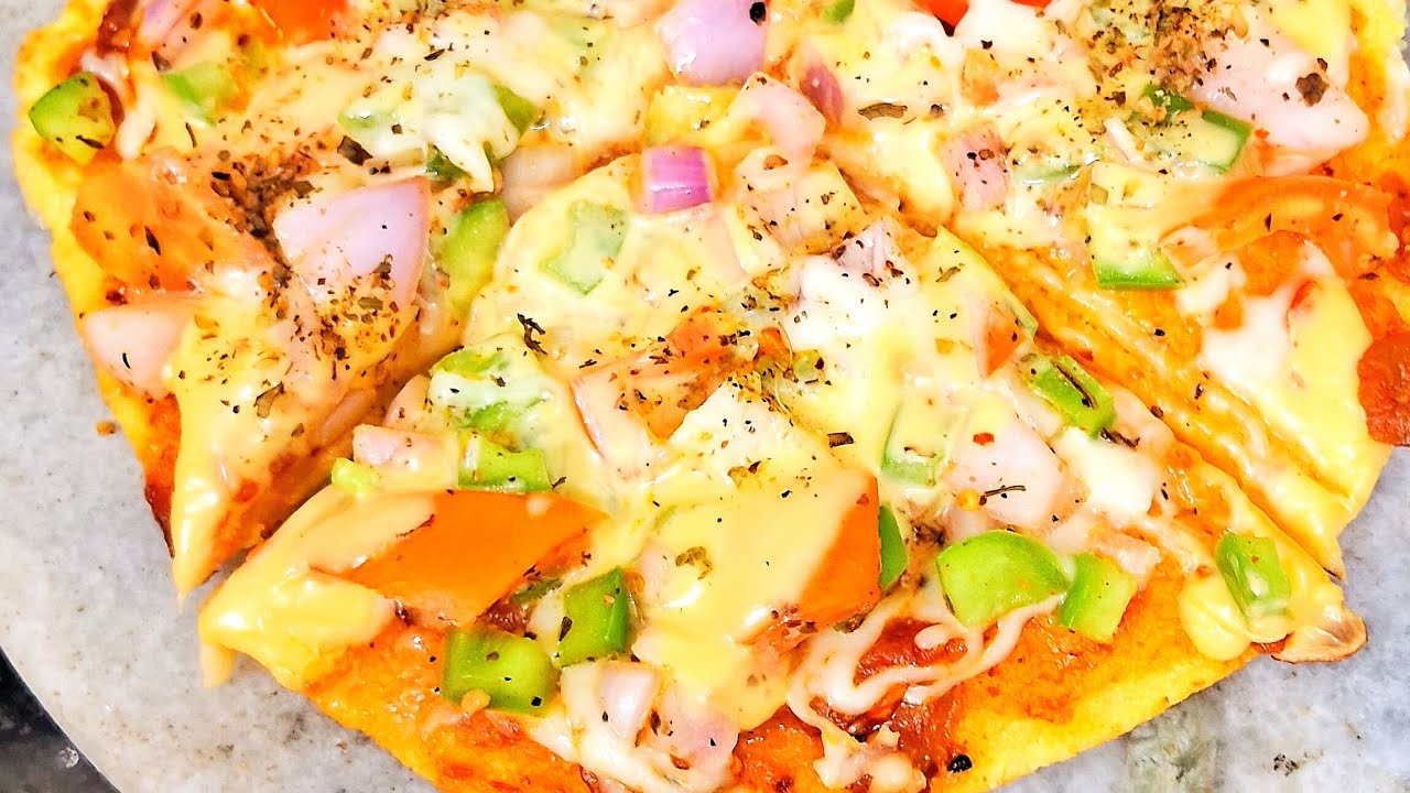 Sooji pizza | बिना मैदे और ओवन के मिनटों में बनाएं टेस्टी सूजी पिज्जा | No maida pizza recipe |pizza