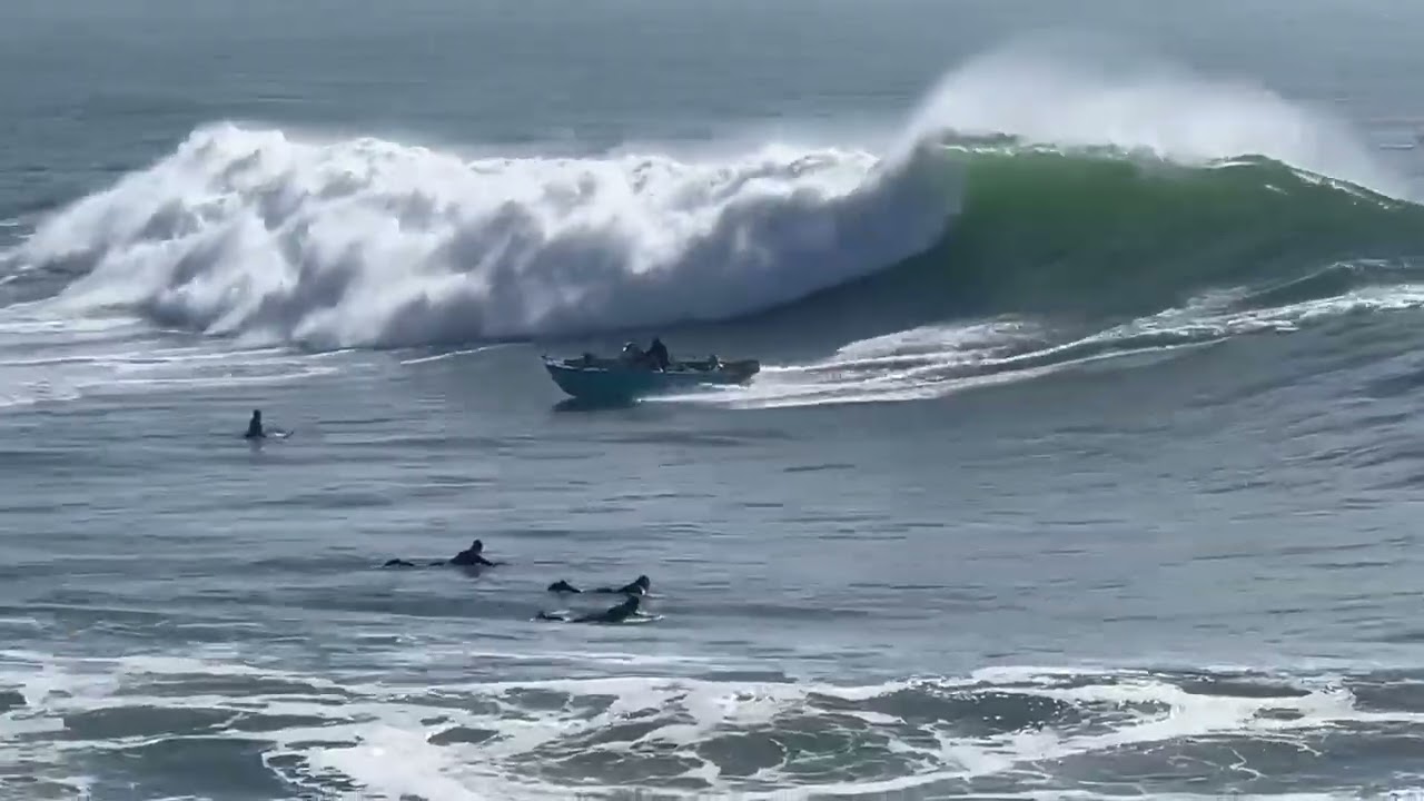 Boat capsizes in waves at Steamer Lane in Santa Cruz