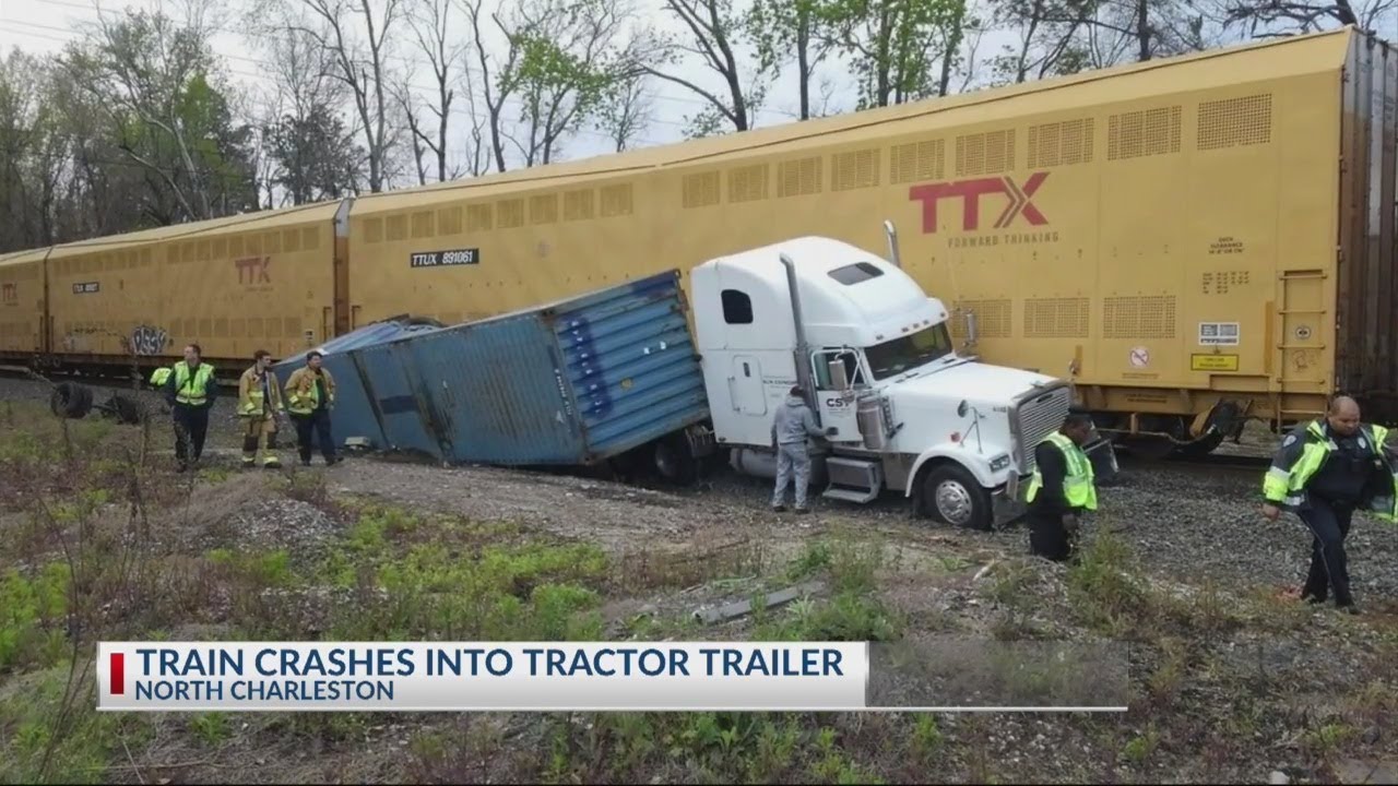 Train crashes into tractor trailer