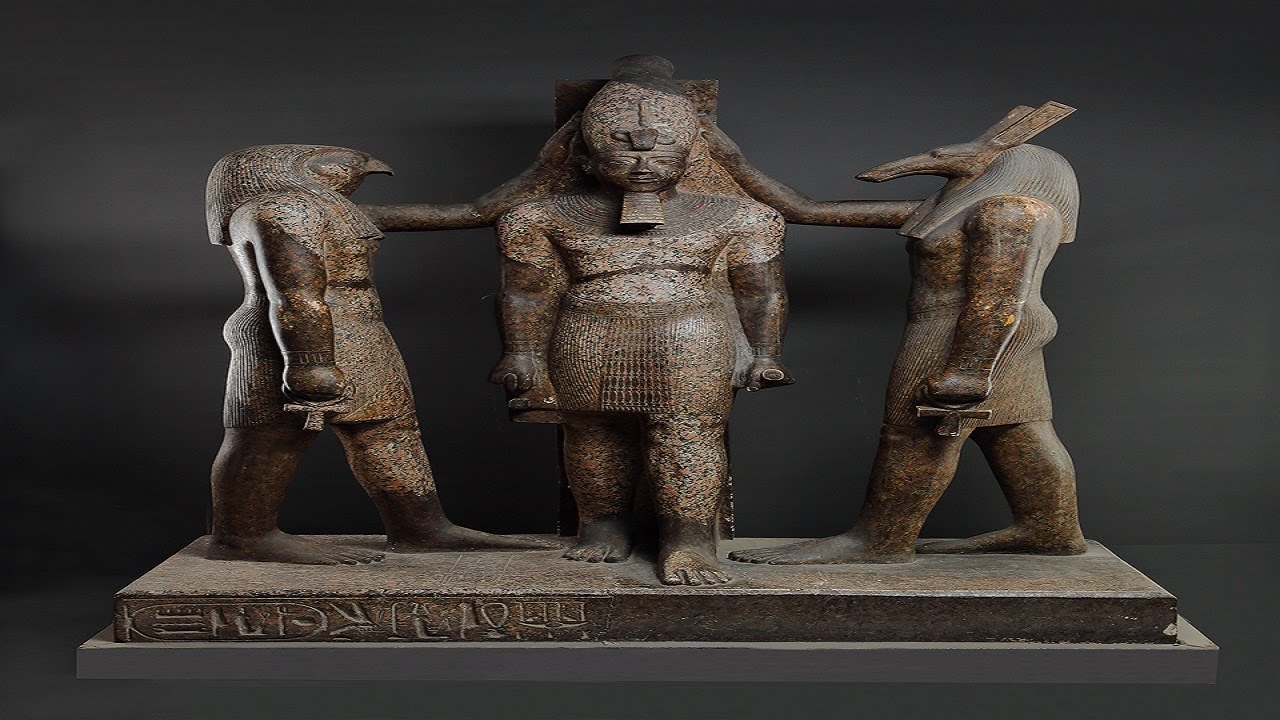 Statue of Ramses III between Horus and Seth
