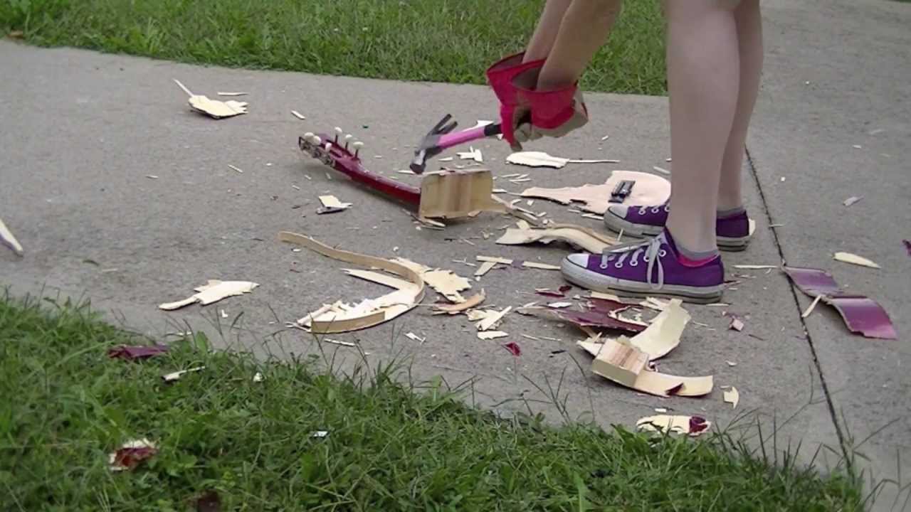 Smashing a guitar with a hammer (I'llSmashItWithAHammer)