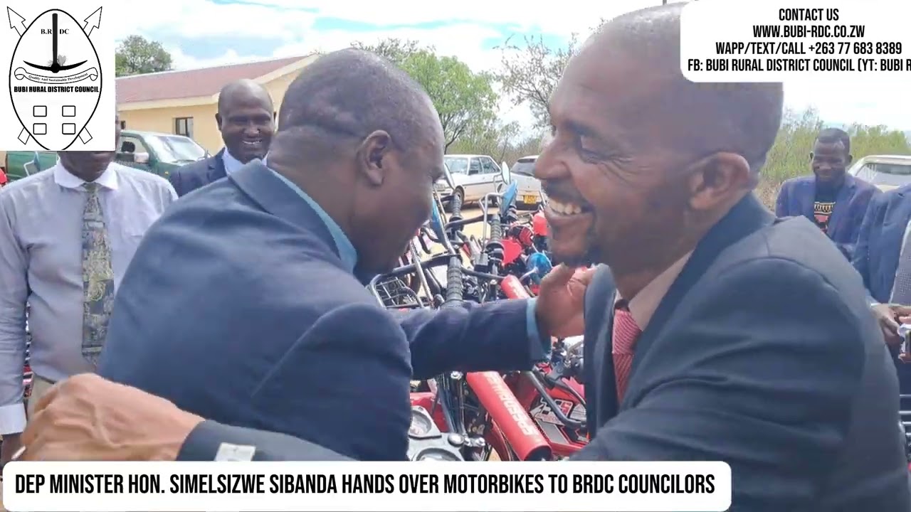 Hon S Sibanda handing over bikes to BRDC Councilors