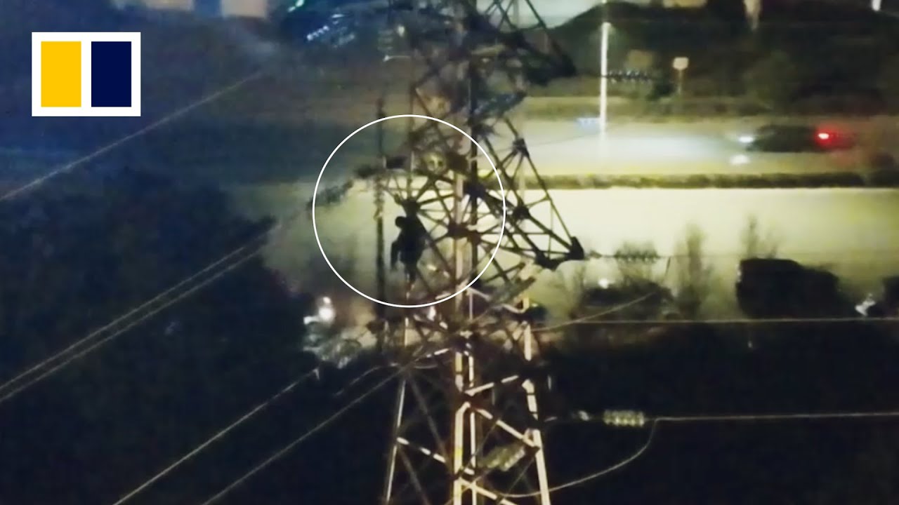 Chinese woman climbs up 40-metre transmission tower after arguing with son