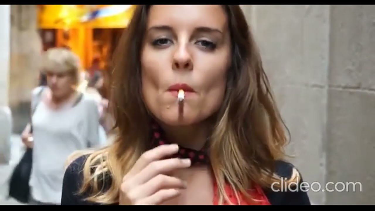 Cute girl smoking outside