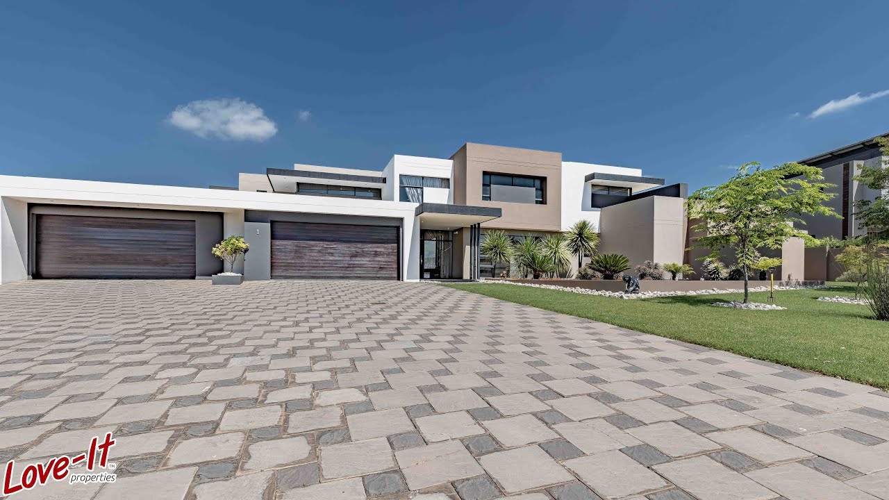 Modern Mansion with detailed designs inside and out with views of a greenbelt!