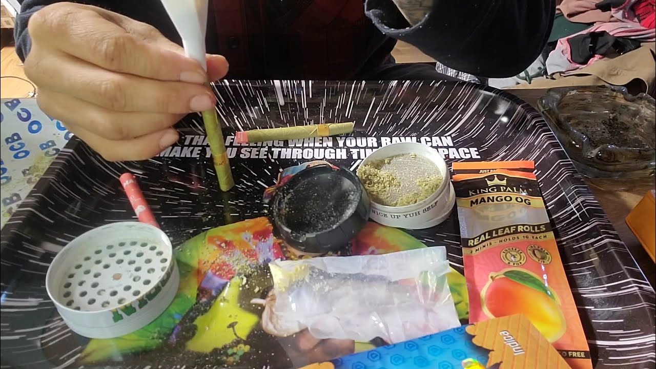 filling a king palm mango OG real leaf roll AAAA flower plus ice cream shatter dust