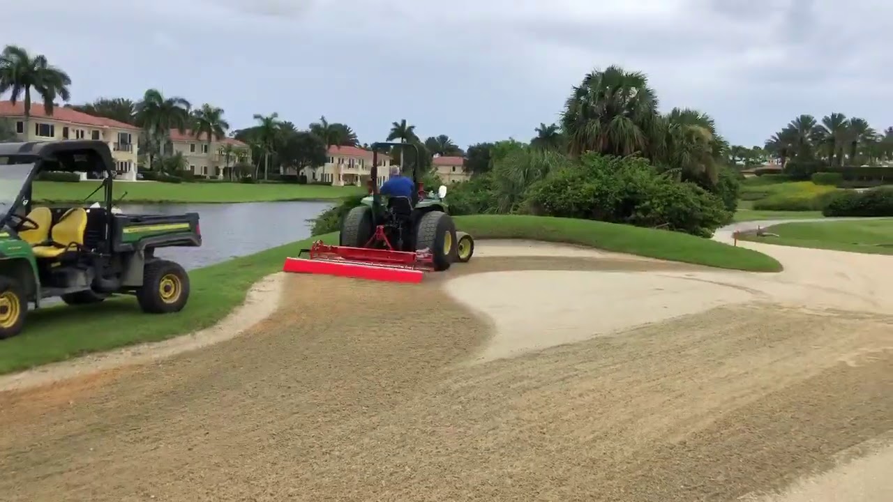 Terra Rake with a finishing brush on Coquina bunkers