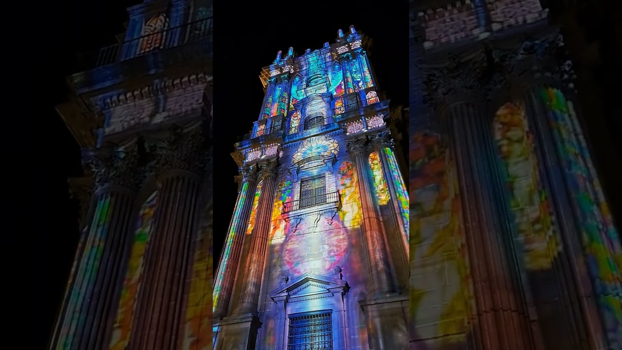 Spectacular light show projected on to a tower of Malaga Cathedral. December 2025.