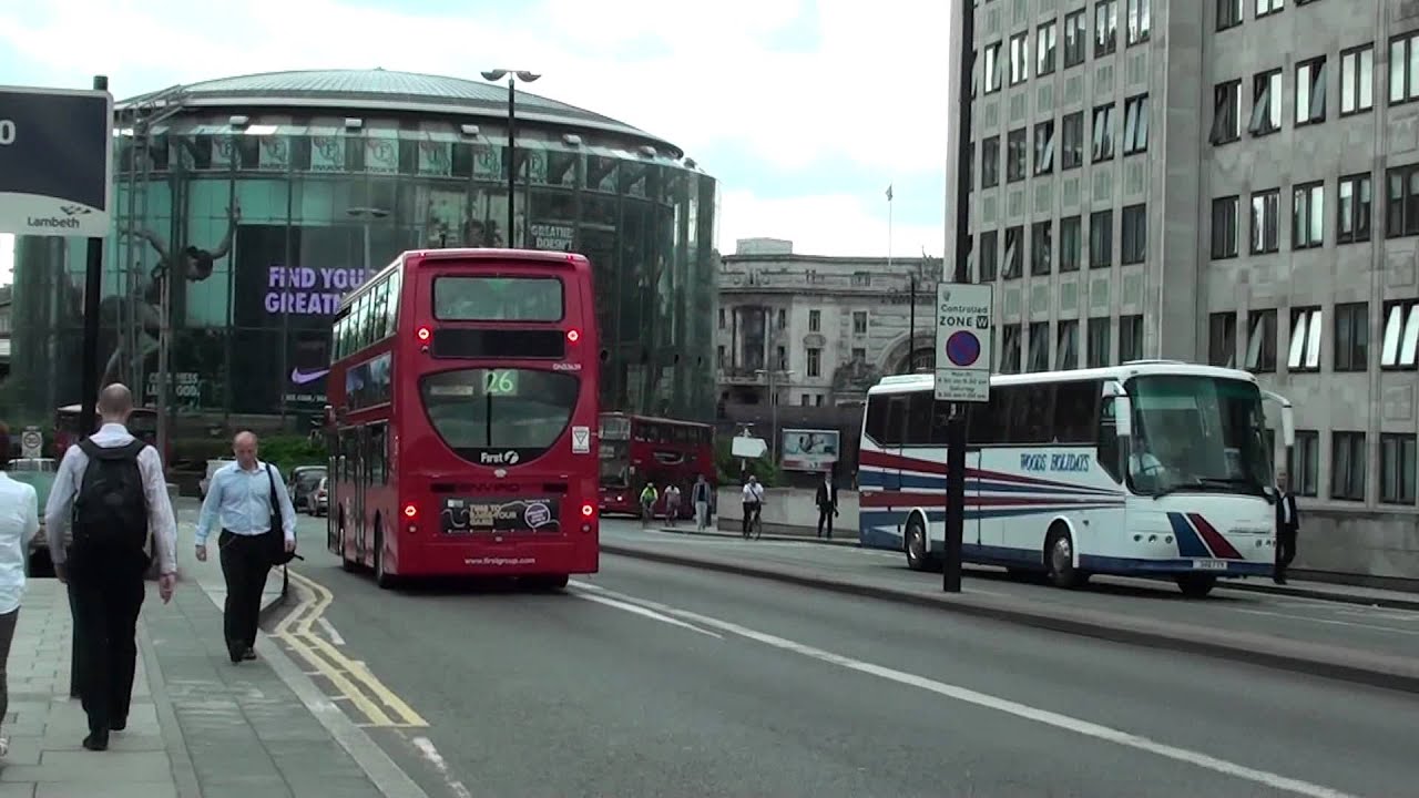 (HD) A variety of London Buses on Waterloo Bridge