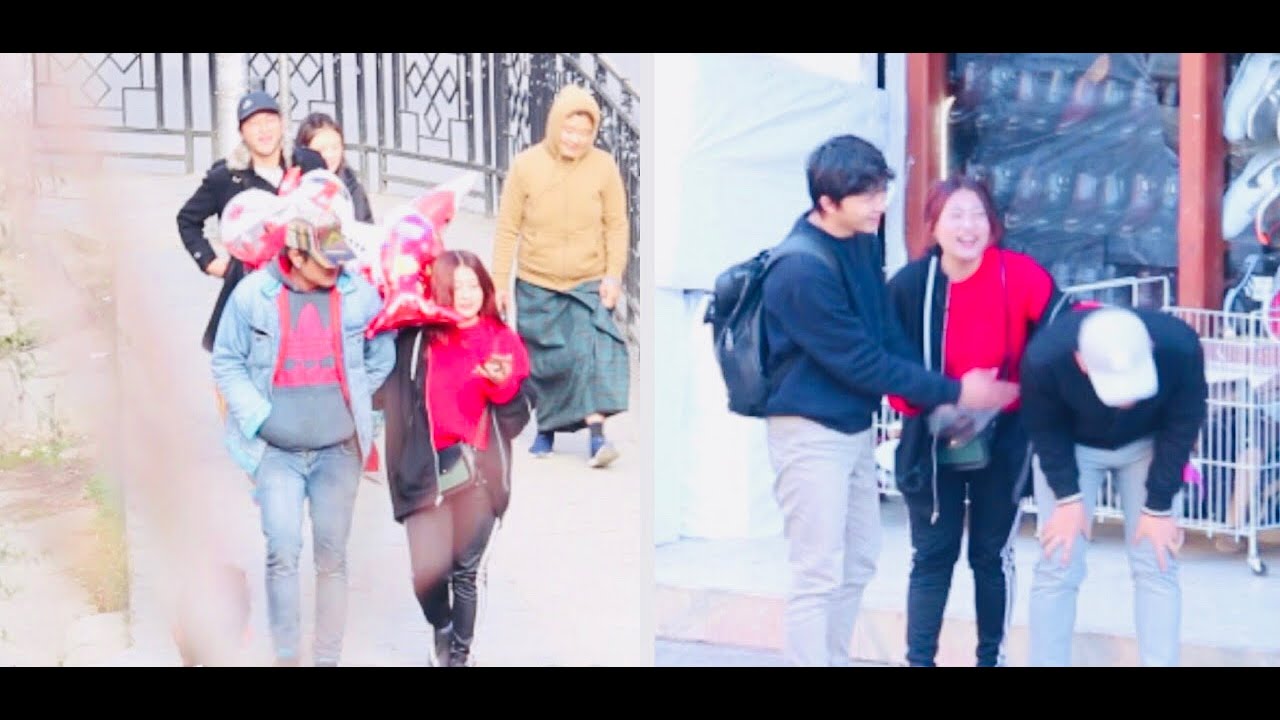 Holding hands of strangers