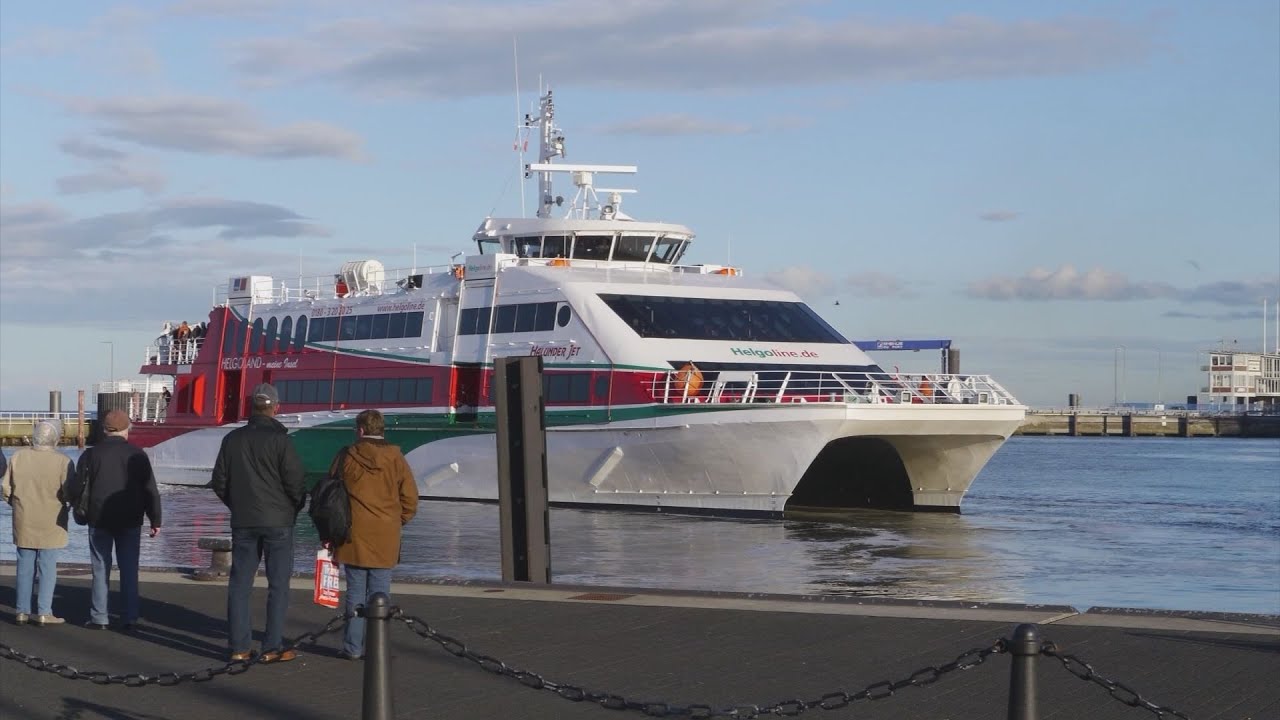 Grün ist das Land ,  Rot ist die Kant ,  weiss ist der Sand ,  das sind die Farben von Helgoland.