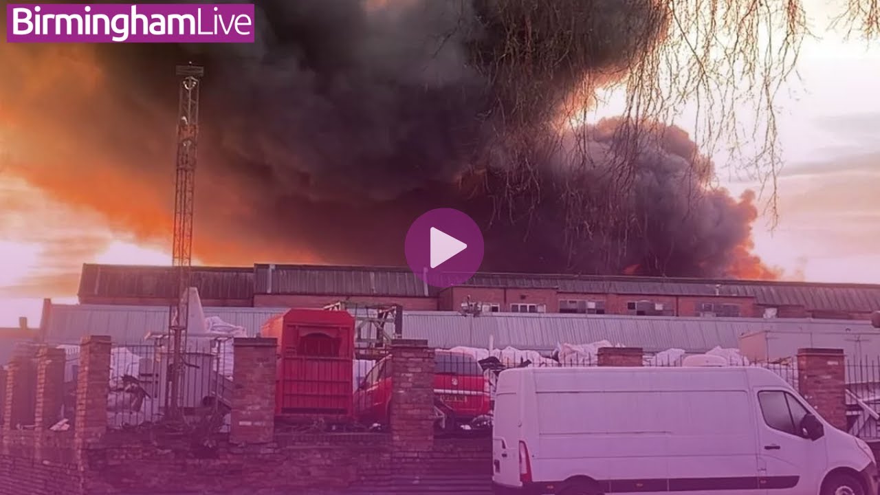 Firefighters tackle factory blaze as thick smoke makes it 'hard to breathe'