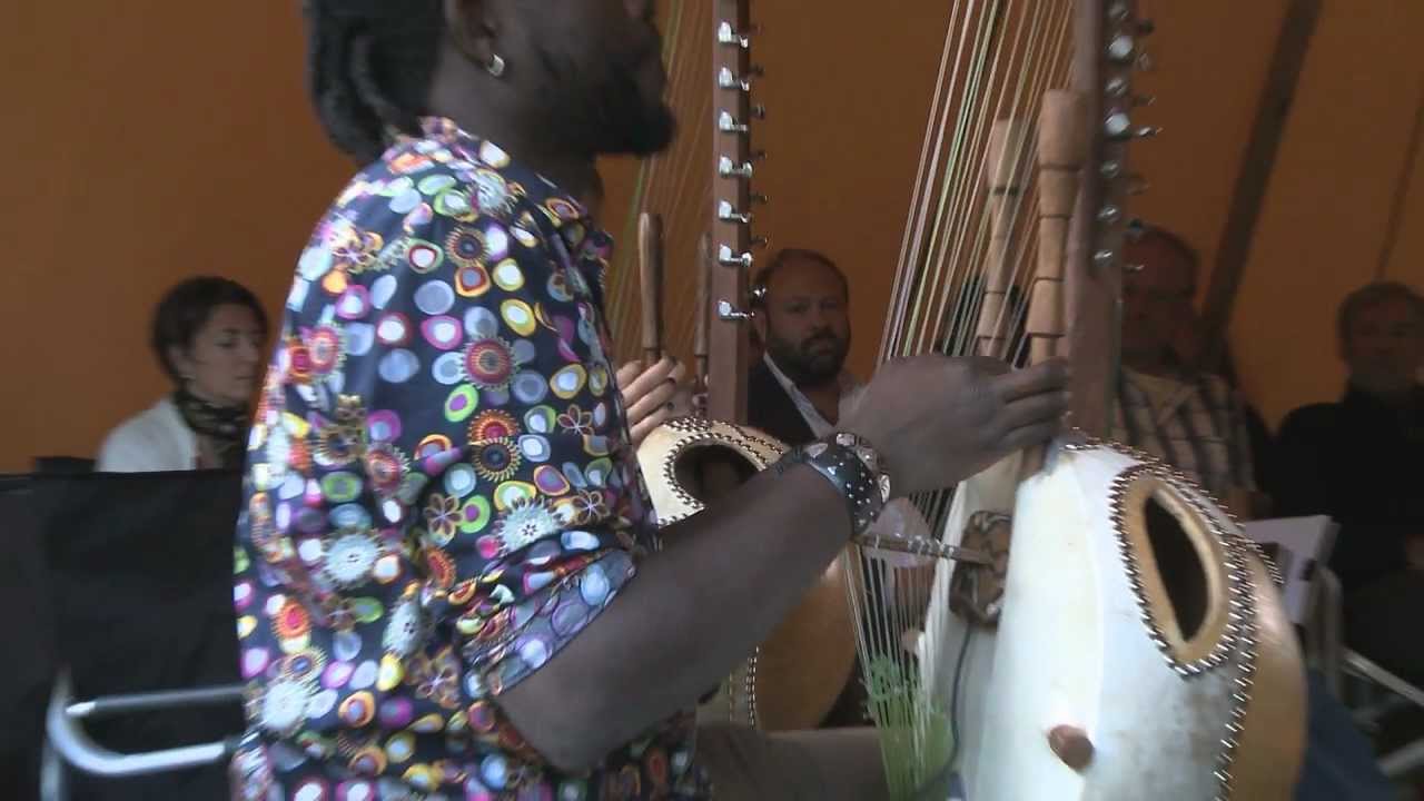 Sousou and Maher are playing the kora.