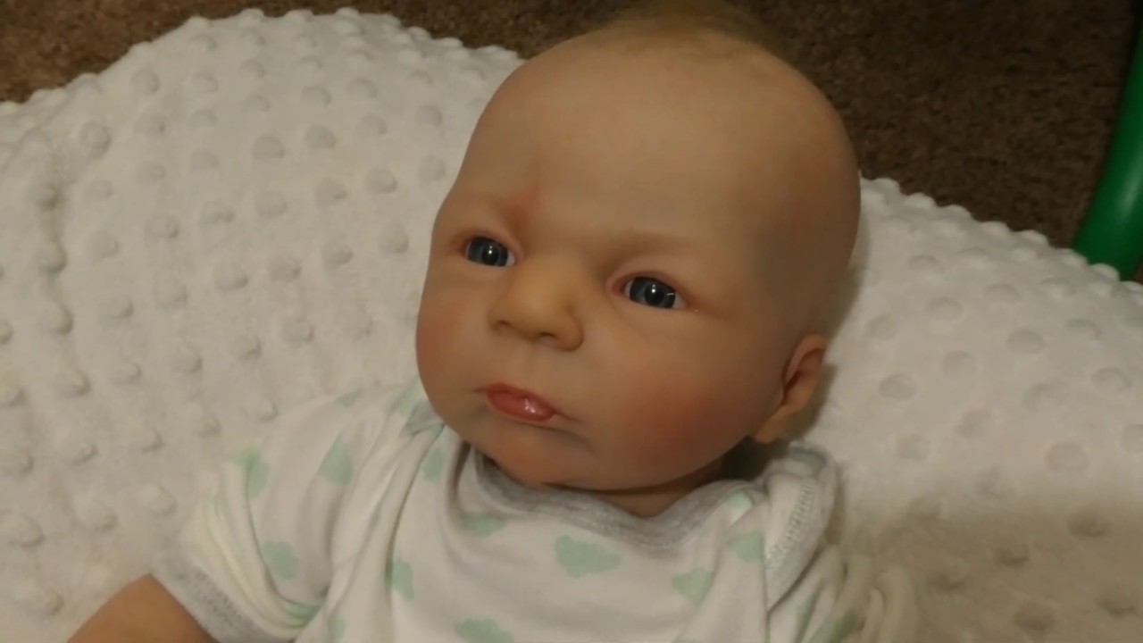 The first reborn I made compared to recent ones/7 years apart!