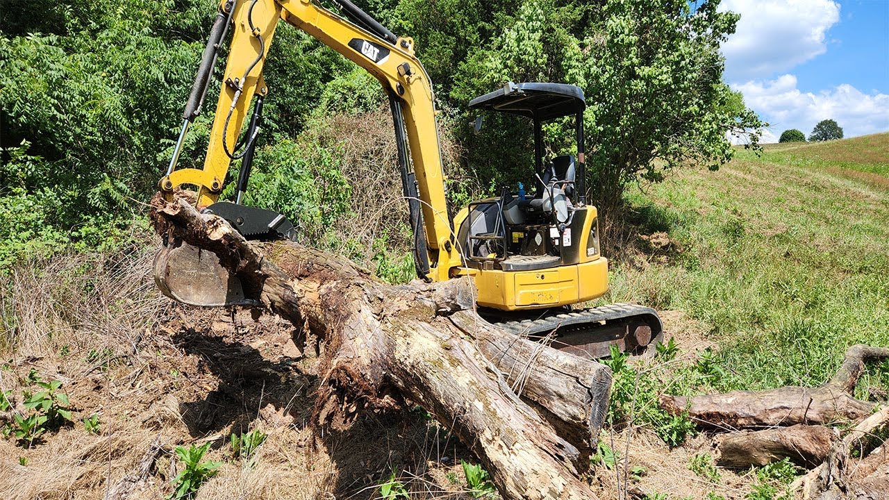 Buying A Caterpillar Excavator And Installing A Hydraulic Thumb
