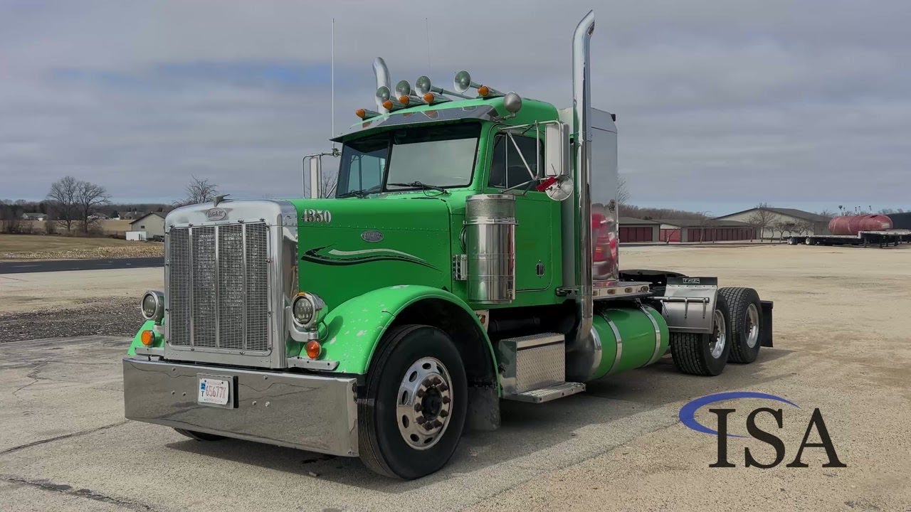 1696 - 1999 Peterbilt 379 Day Cab Truck Tractor will be sold at auction!