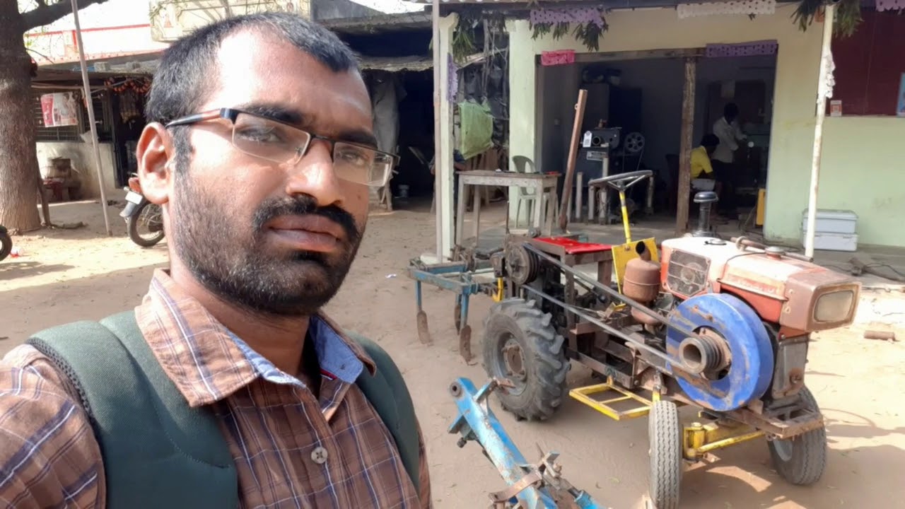 modified power tiller to mini tractor by village Farmer